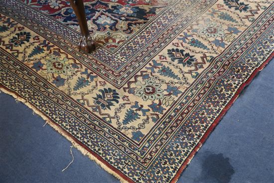 A Persian blue ground carpet, 17ft 11in by 10ft 1in.